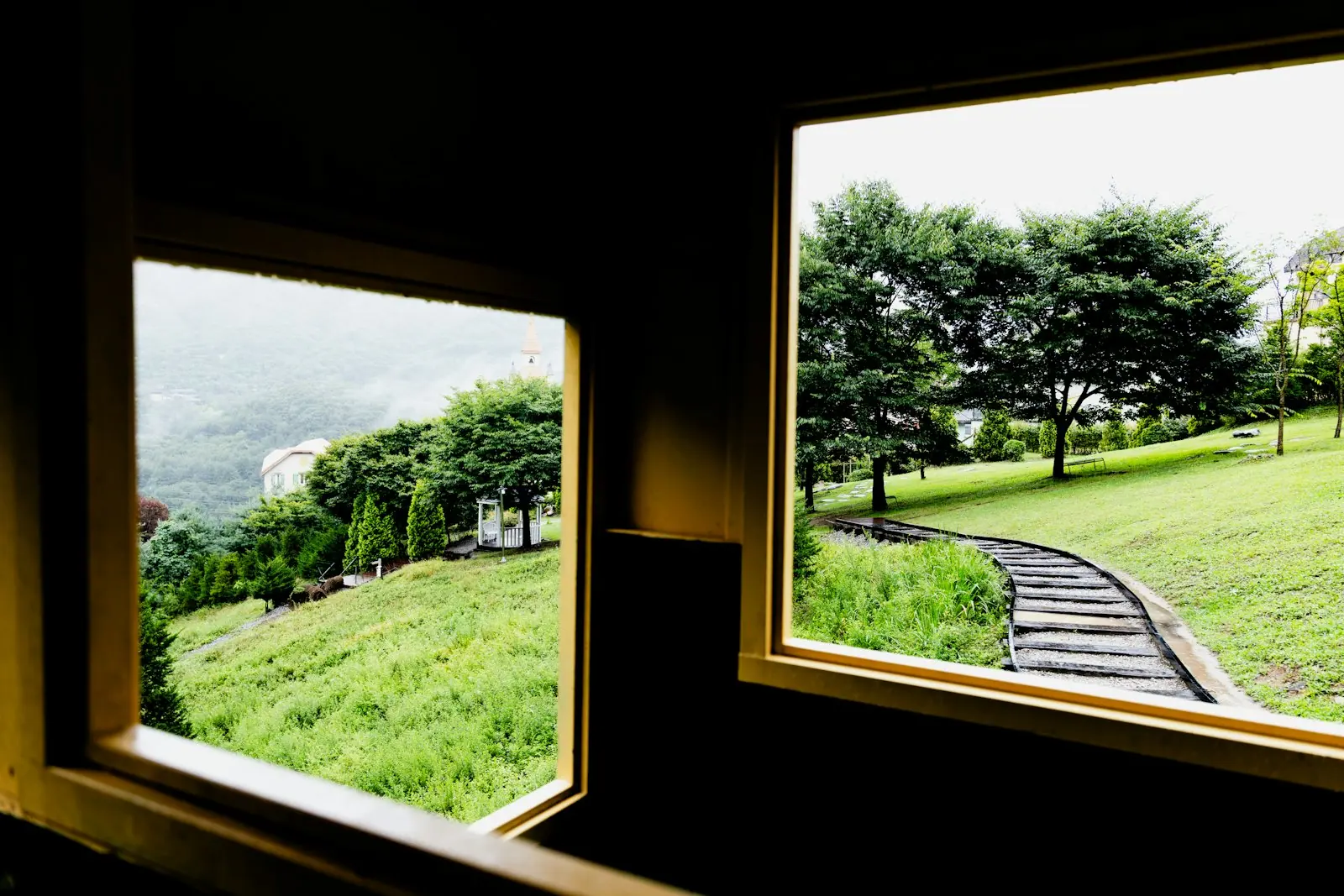 A guest room looking out onto greenery