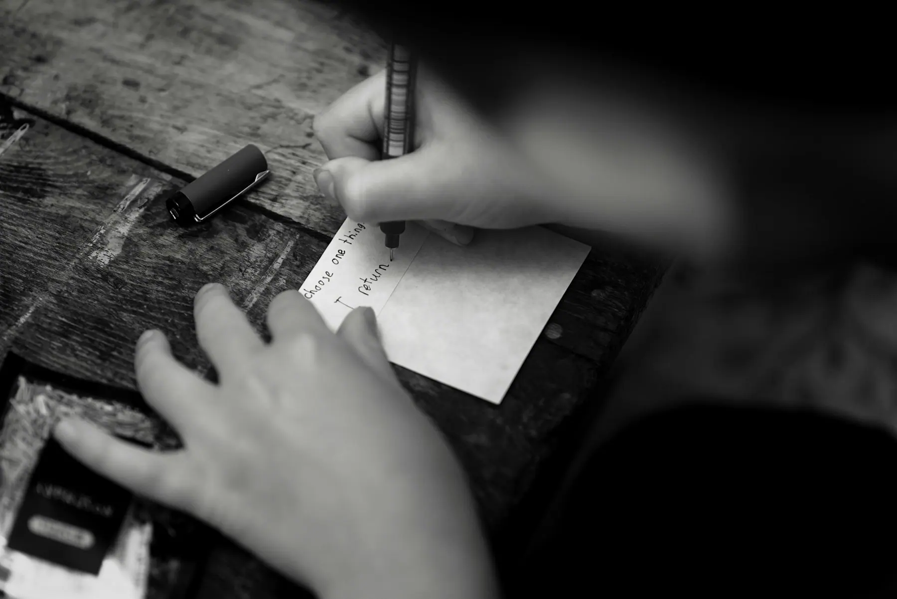 A consultation notebook resting on a wooden desk