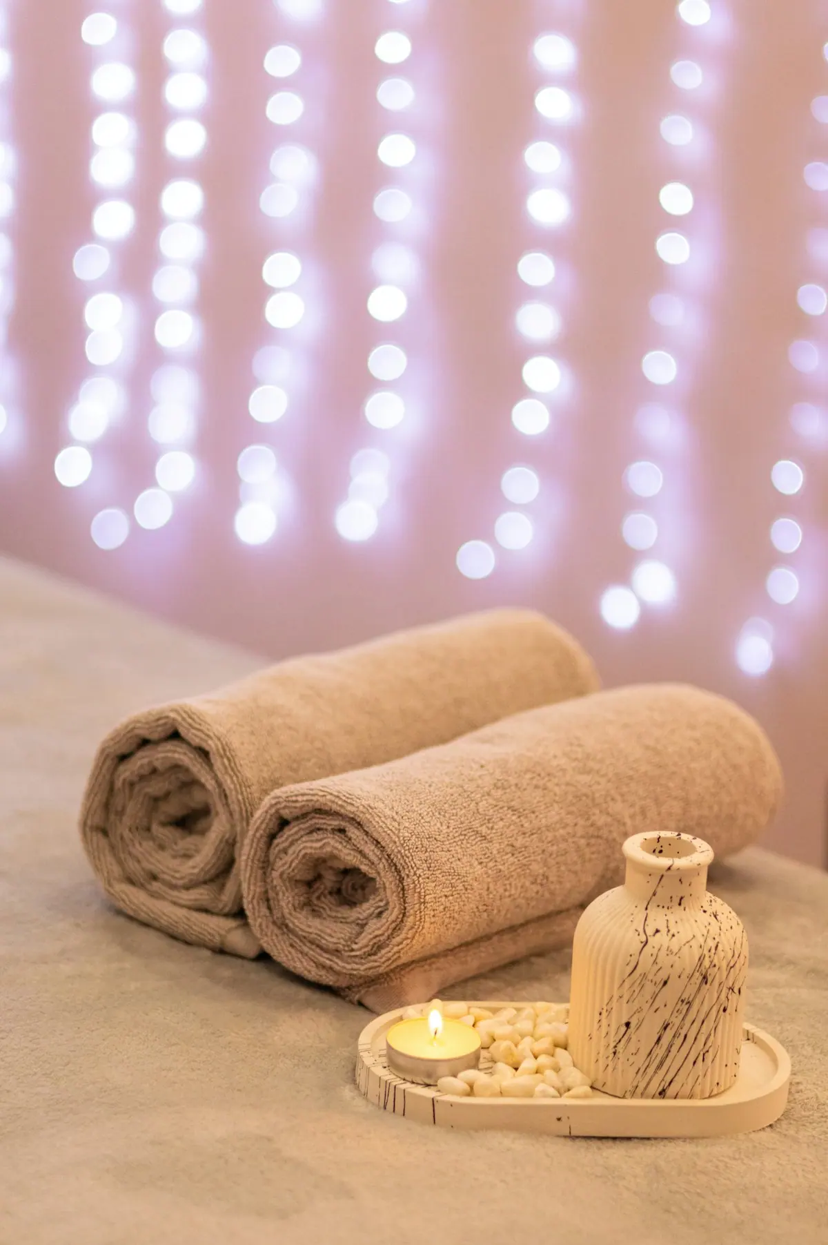 A minimal, candlelit therapy room