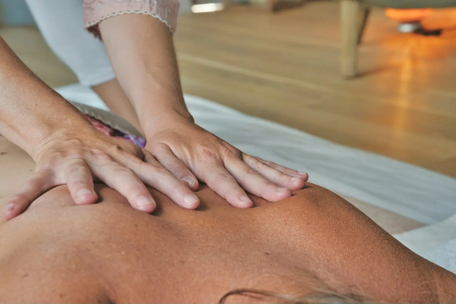 A traditional warm oil therapy in progress