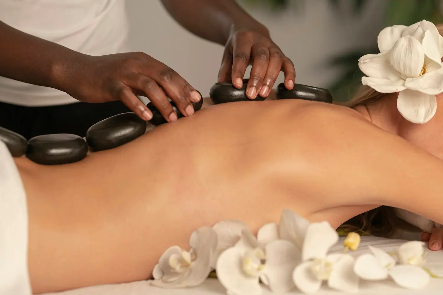 A therapist applying precise pressure during treatment
